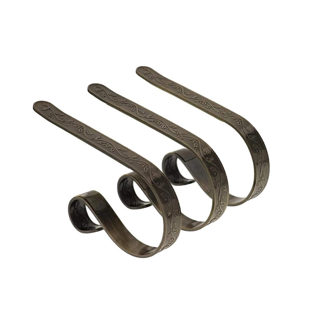 Buy π Original MantleClip® Holly Antique Brass Stocking Holders, 3ct. by Haute Decor π 1 Buy π Original MantleClip® Holly Antique Brass Stocking Holders, 3ct. by Haute Decor π